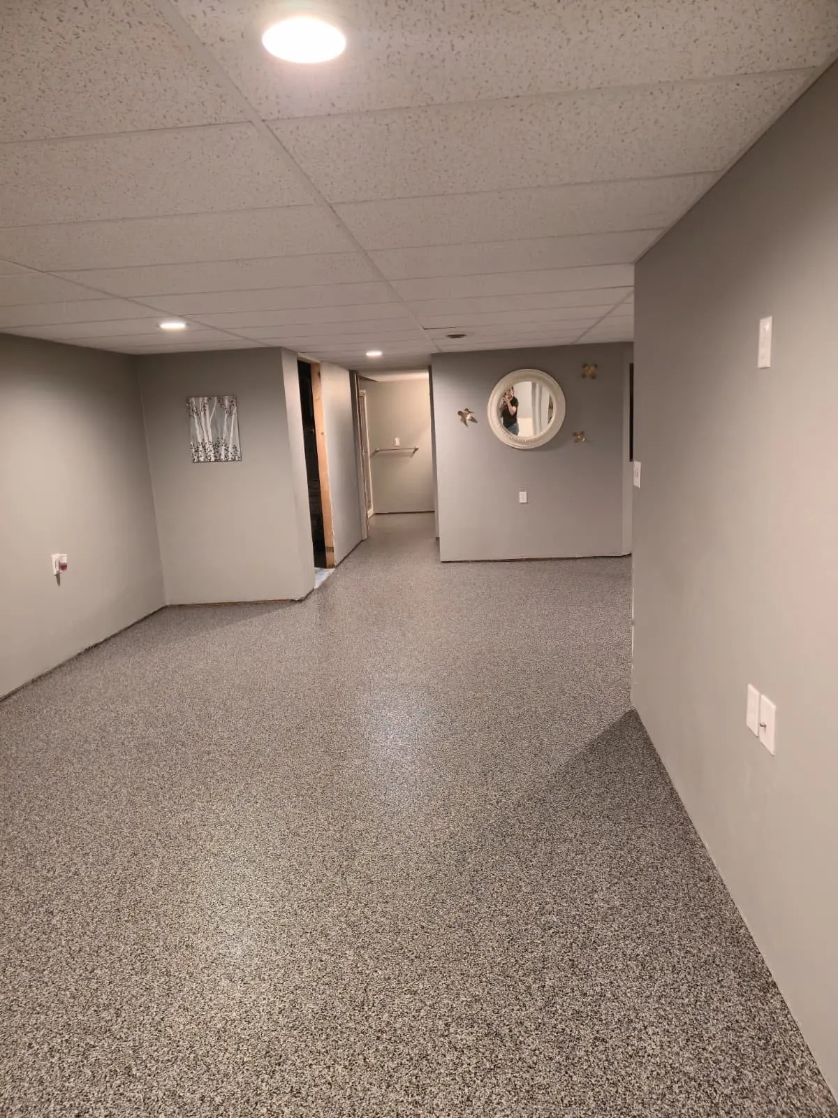 Basement hallway with seamless flake epoxy floor