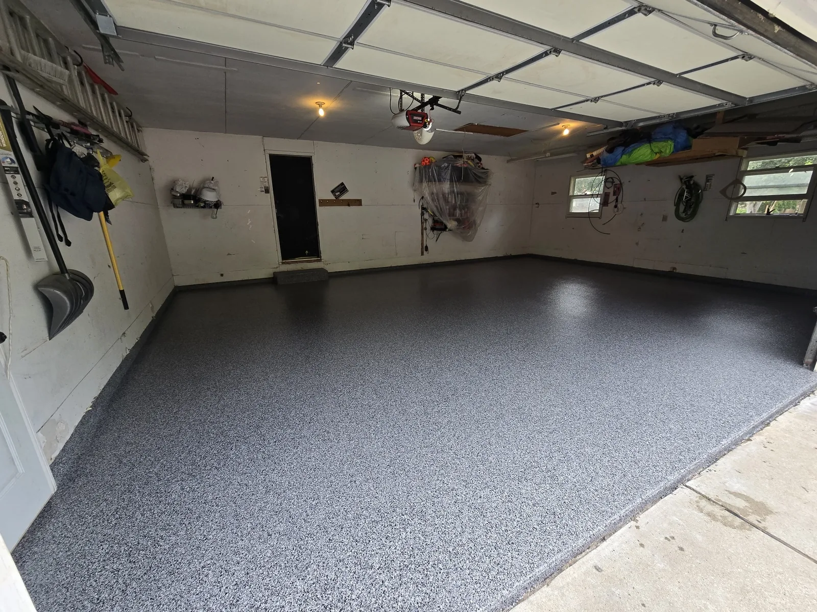 Charcoal flake epoxy garage floor in Green Bay, WI