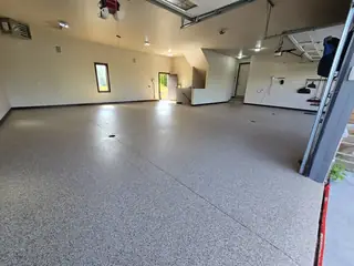 1000 sq ft garage floor with pecan flake epoxy finish in Howard, WI