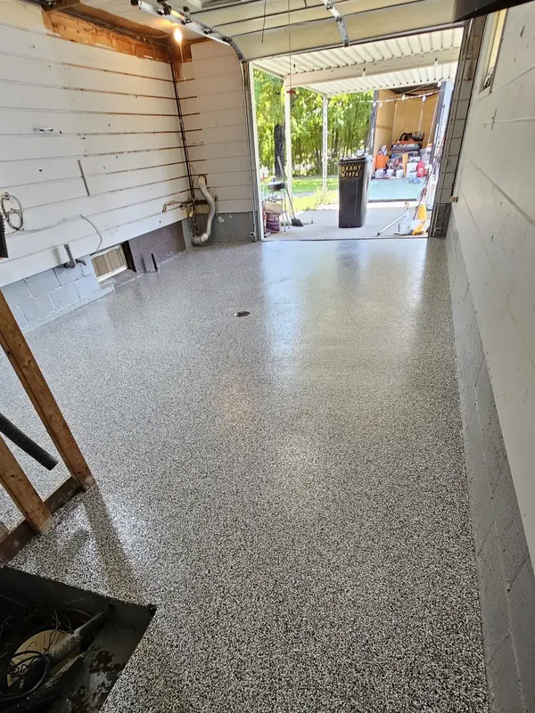 Metallic epoxy floor with marbled finish in De Pere, WI